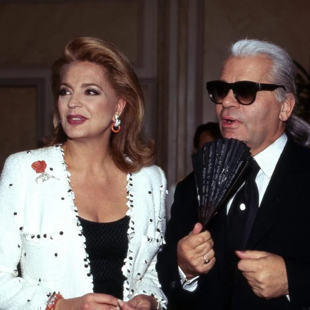 Ira de Fürstenberg, with designer Karl Lagerfeld, in Germany, after a fashion show. 