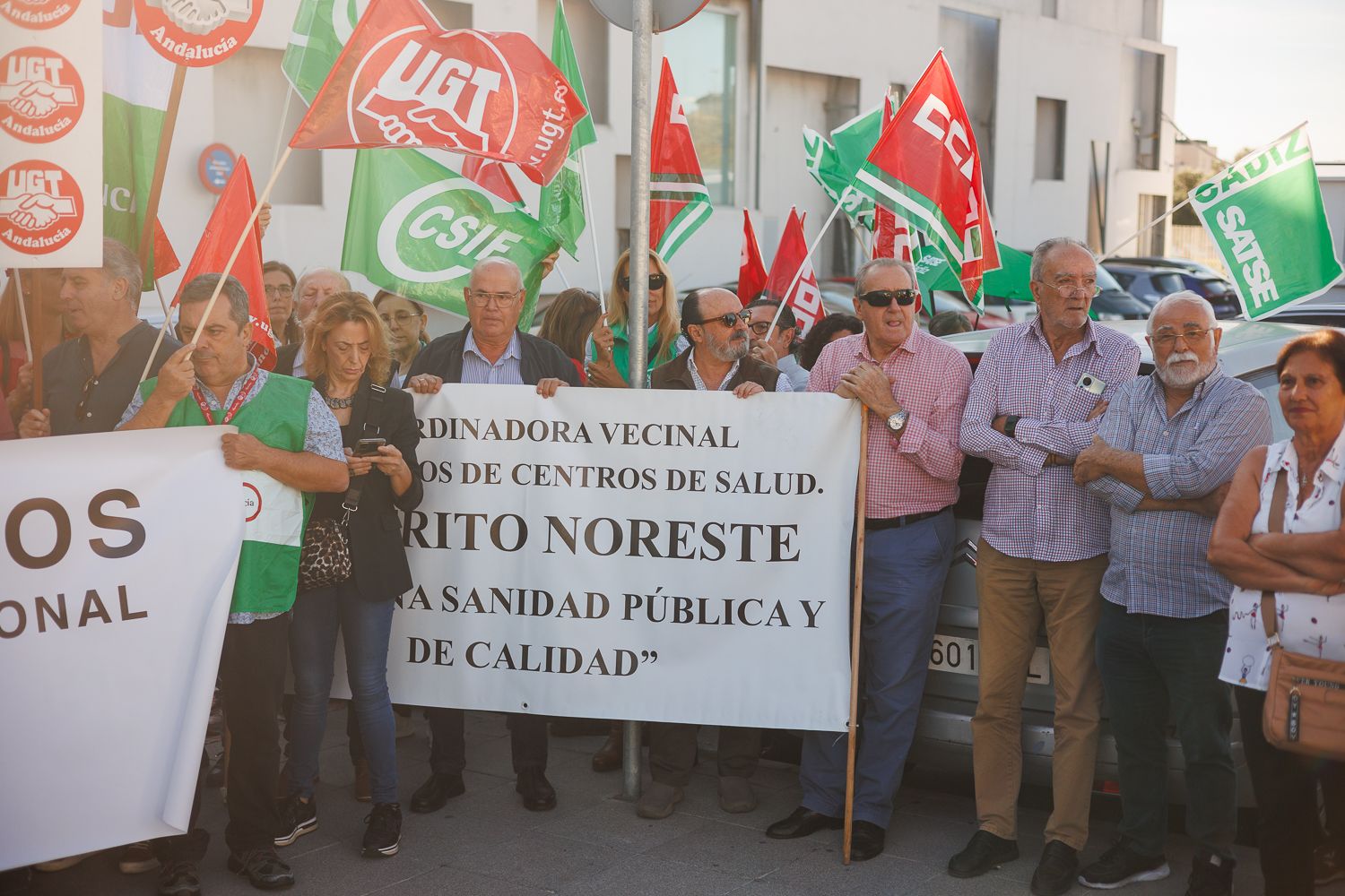 Neighborhood associations present at the protest at the La Milagrosa health center.