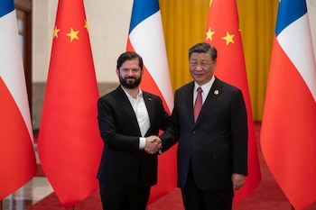 Chinese President Xi Jinping and Chilean President Gabriel Boric shake hands during a welcoming ceremony in Beijing on October 17, 2023 (Presidential Palace/Marcelo Segura/Handout via Reuters)