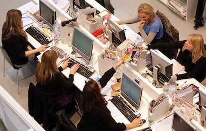 Journalists in the editorial office of a London magazine in 2008.